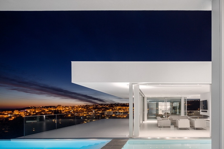 View from Modern Villa Escarpa by Mario Martins at night 