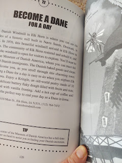 inside view of 100 Things to do in Iowa Before You Die by Sara Broers, featuring the Danish Windmill in Elkhorn Nebraska, with information on the left and a black and white photo of the windmill on the right