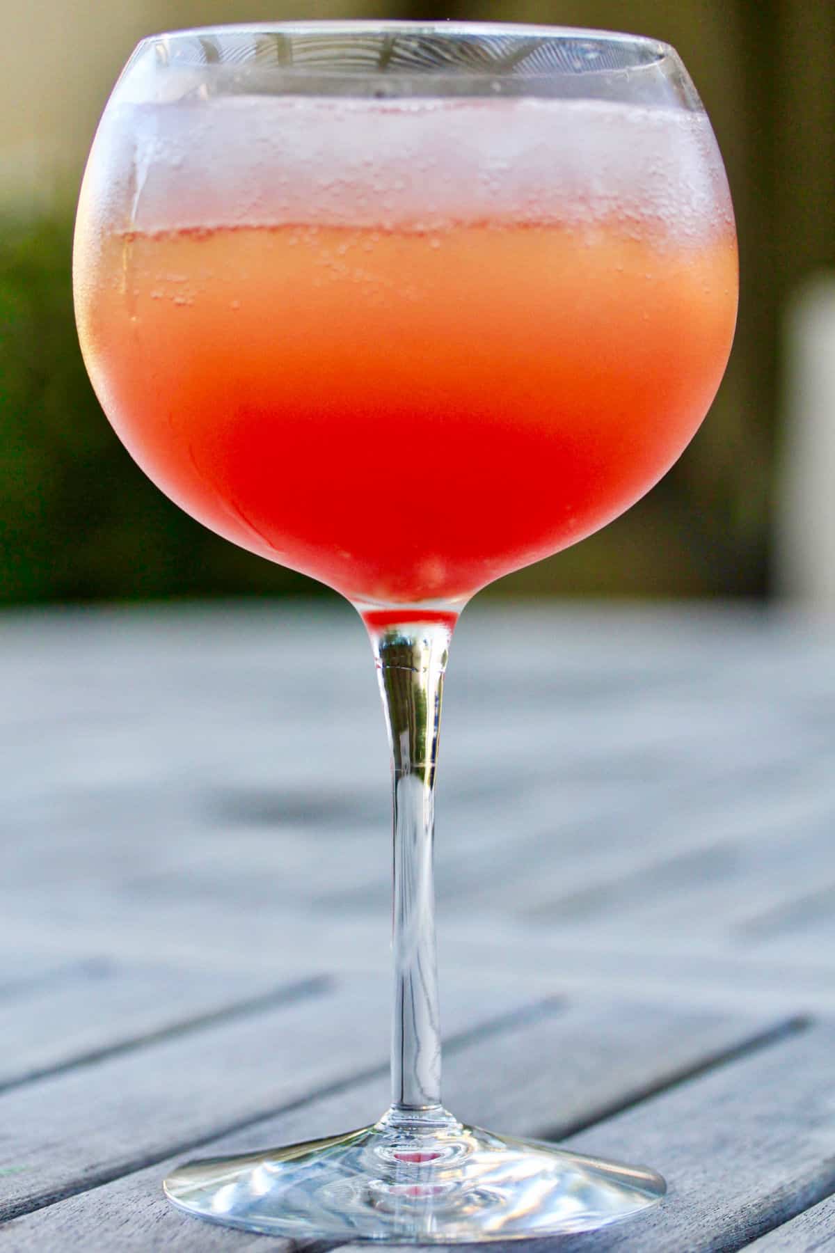 Watermelon Rum and Sparkling Wine Cocktail in a Goblet.