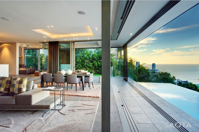 Modern living room by the terrace and swimming pool