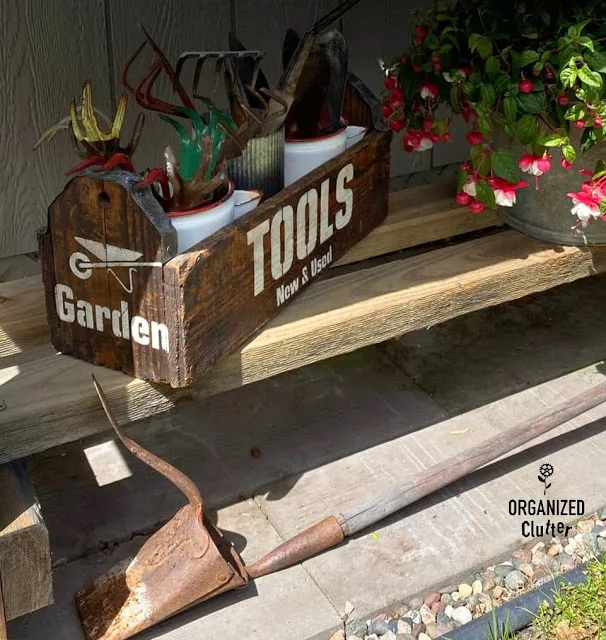 Photo of a garden tools stenciled rustic toolbox