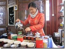 A girl preparing cineese tea