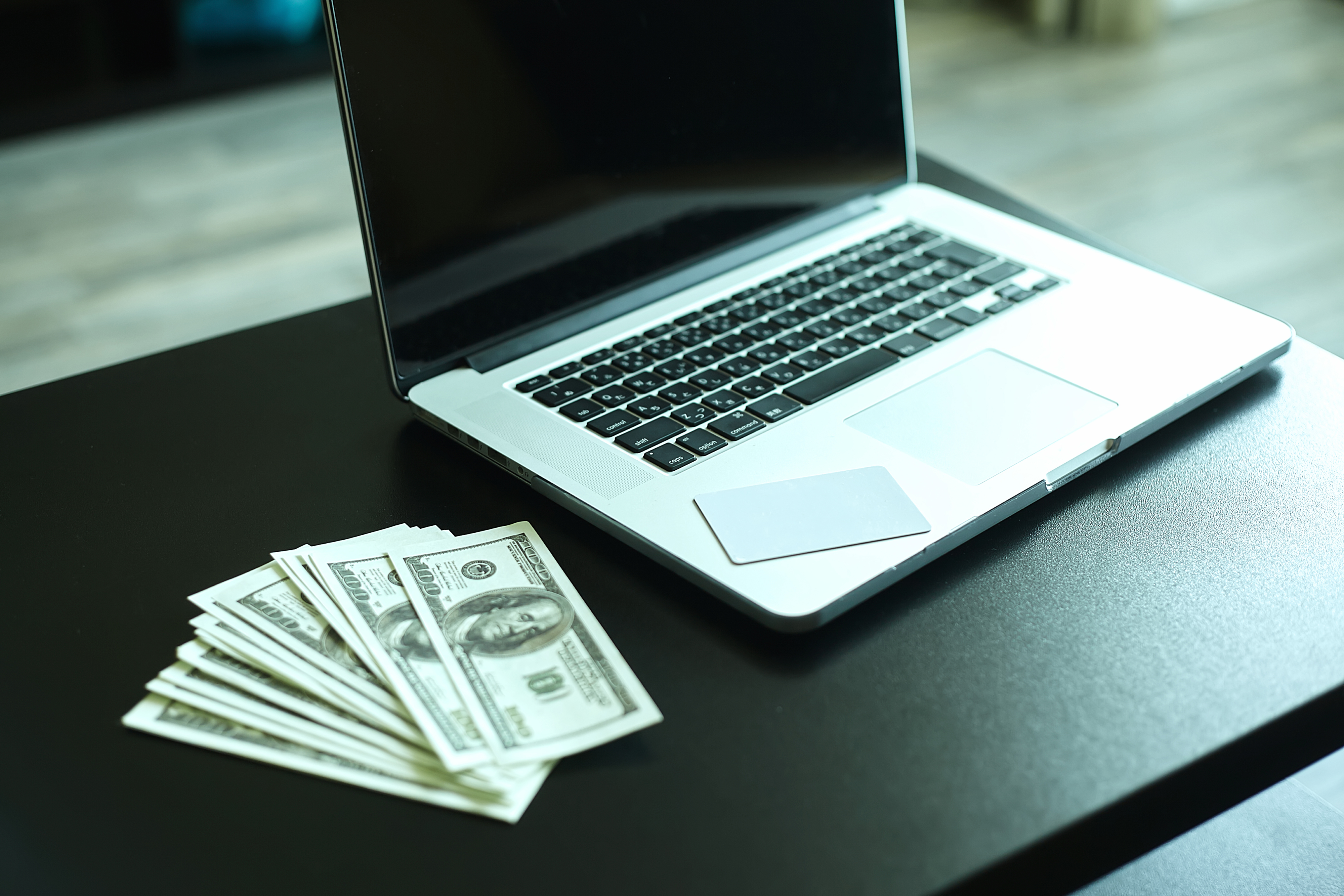 laptop of freelancer who make money from his online work like Fiverr