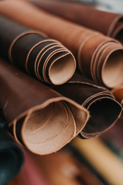 Rolls of various types and colors of leather