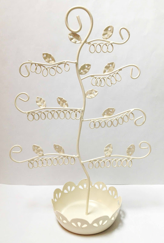  type in 'Earring tree' into eBay and your find many different designs title=