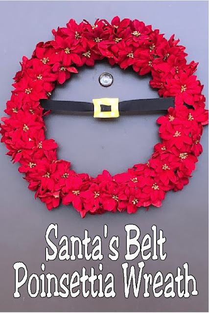 Create a beautiful and simple Santa's belt for your Christmas door with this simple DIY using ribbon, mini poinsettias, and glue.  So easy and so festive.  #santasbelt #christmaswreath #christmasdecor #poinsettia #diypartymomblog