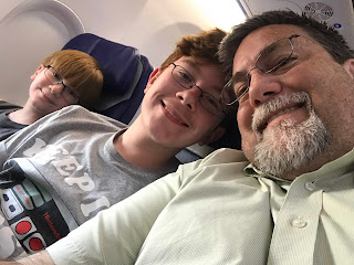 David Brodosi and family on airplane traveling to grand canyon