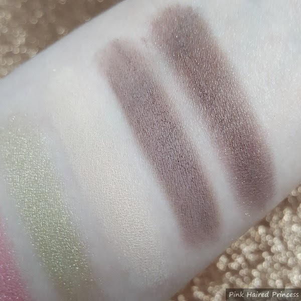 close up swatches on pale skin of Heaven, Like A Virgin and Erotica Too Faced eyeshadows