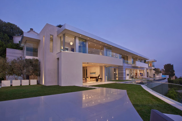 Back facade of modern home at the dusk 
