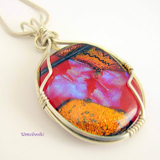 https://umeboshi.indiemade.com/product/argentium-sterling-silver-wire-wrapped-dichroic-pendant-heart-vulcan-dichroic-glass-cabochon