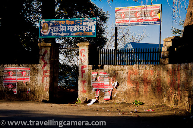 This PHOTO JOURNEY is about one of the wonderful walks around capital city of Himachal Pradesh, INDIA. Since Shimla is blessed with wonderful weather throughout the year, people love to walk from one place to other and now many tourists love to explore these walks and few of them avoid due to age issues. Above photograph shows Sanjauli from the road which connects Sanjauli Market with Mall Road through IGMC and Lakkar Mazar...The first thing which comes on the way to Mall Road from Sanjauli Market. Sanjauli College 'Rajkiya Mahavidyalaya, Sanjauli' ... It's one of the popular educational institution in Shimla !!!This is new building on Government College Sanjauli... Somehow all the buildings in Shimla are beautiful and each one sets new standards in terms of architecture ...This is huge complex of biggest Medical College of Himachal Pradesh. Indira Gandhi Medical College, Shimla.Main building on Indira Gandhi Medical College (IGMC), Shimla !!! This whole campus has one hospital and a Medical college. This is one of the most advanced hospital  in Himachal Pradesh, INDIA. Place is also known as snowdown.This is one of the popular walks around Mall Road. Few years back, cycles were also available on rent for this route form Sanjauli to Mall Road !!! This is approximately 3 kilometers walk through some of the beautiful spots on the way...It's impossible to reach Mall Road, without meeting monkeys on the way and we were lucky to have a silent meeting :) ... This family was happily sitting on roof-top !!!It was evening time and after crossing IGMC, we got to see the hues of sunset in Shimla. Have you see clear sun like this? It's easy to find full moon like this but brightness around the sun always hide the actual shape.After few miles of walk on relatively calm roads, we hit Lakkar Bazar. Lakkar Bazar is one of the main markets in Shimla and popular among tourists. There are lot of shops offering wooden materials for home and offices.Since none of us was interested in shopping, we moved towards Ridge with wonderful lighting around Christ Church... Sky was clear on that day and it was blue hour...After having some tea and snacks, we moved towards Mall Road. The building in above photograph is Gaiety Theatre building on Mall Road. This building is renovated last year only.For a change we also visited Lower Bazar, which is relatively cheap and a decent place to buy woolens. This market has various sections - cloth market, spice market, meat market etc...This walk ended in Lower Bazar of Shimla, but most of the folks from Sanjauli love to take this walk for mall road. The other way to reach Mall road is via bus, which is longer route of 8 kilometers. After that one needs ot climb up till Mall Road or take Lift. 