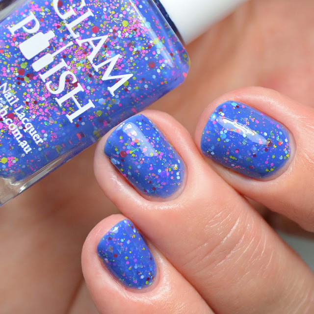 blue nail polish with glitter three finger swatch