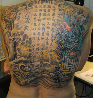 Asian themed back piece tattoo picture