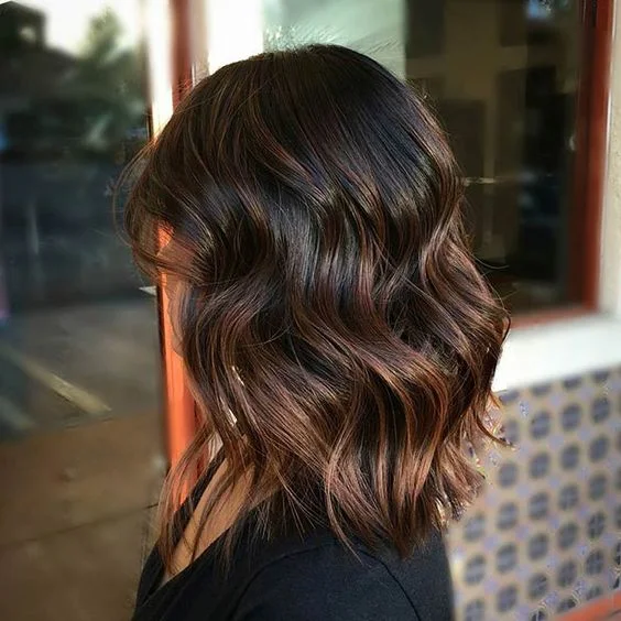 rich chocolate brown hair with caramel balayage highlights