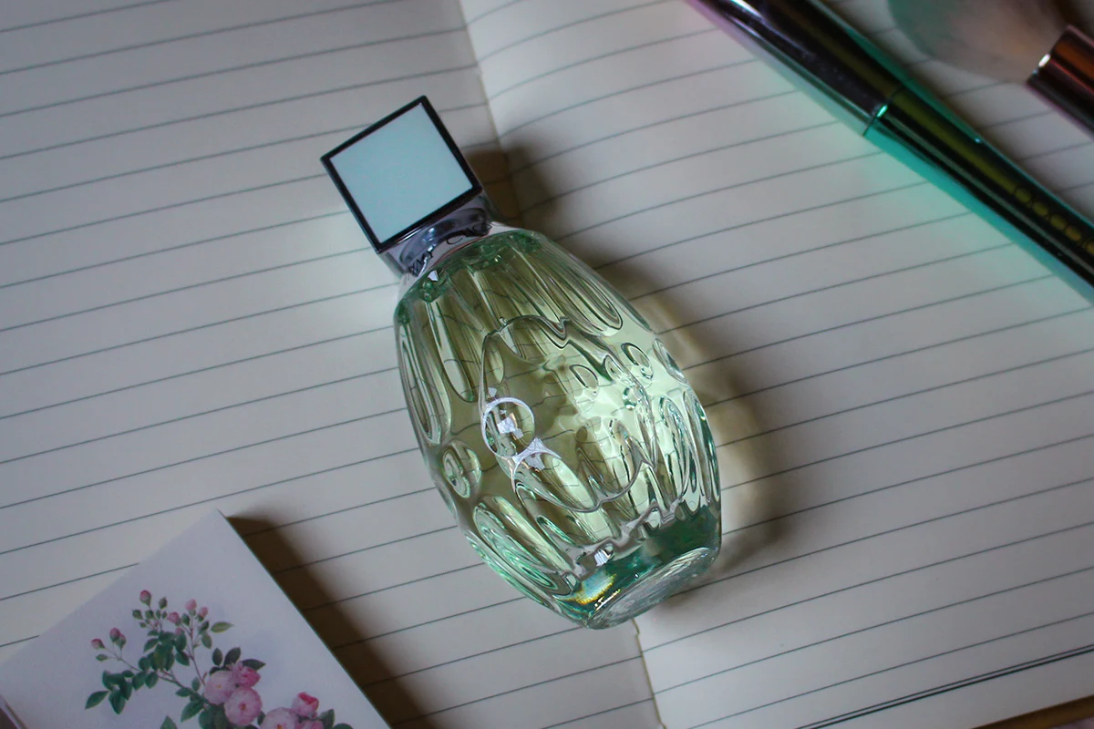 close-up of a jimmy choo floral bottle of perfume