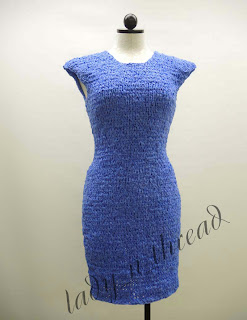 Sustainable fashion – a knit sheath dress using recycled blue wrap (front view)