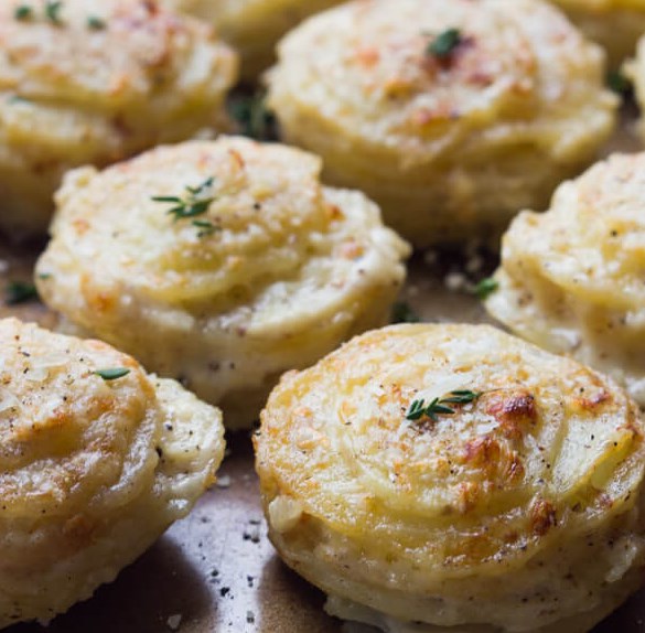 CREAMY POTATO STACKS WITH GARLIC, THYME, AND PARMESAN