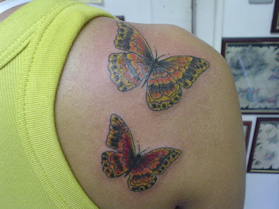 Two Lively Butterflies Tattoo at the Shoulder Image Credit Link 