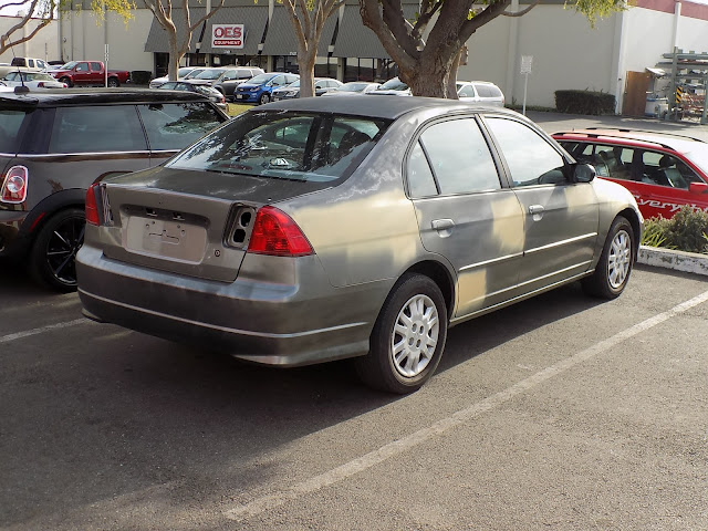 2004 Honda Civic with customer's own primer & body filler work.