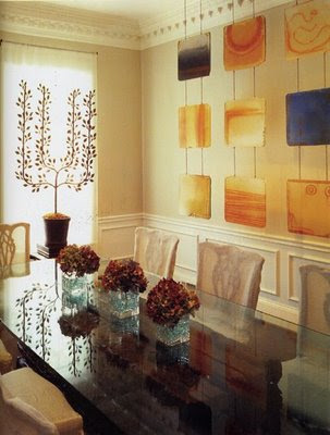 I love the wall sculptures in this dining room, by artist Carrie McGee.