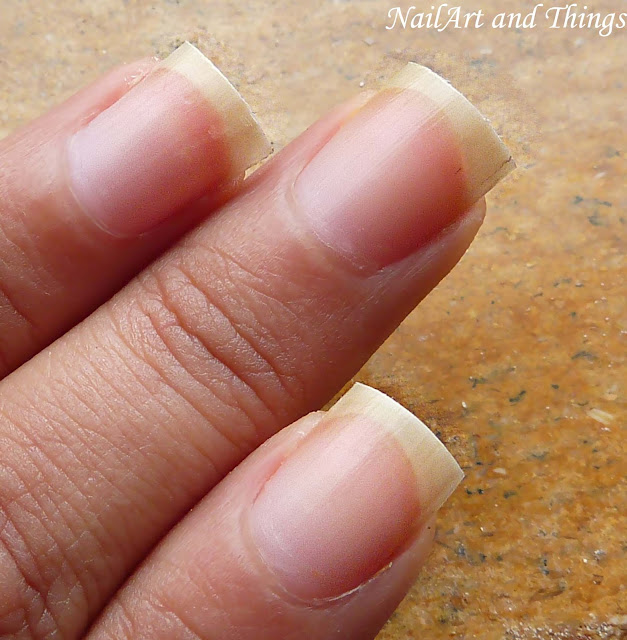 After you cut with scissor, this is how your nails will look.