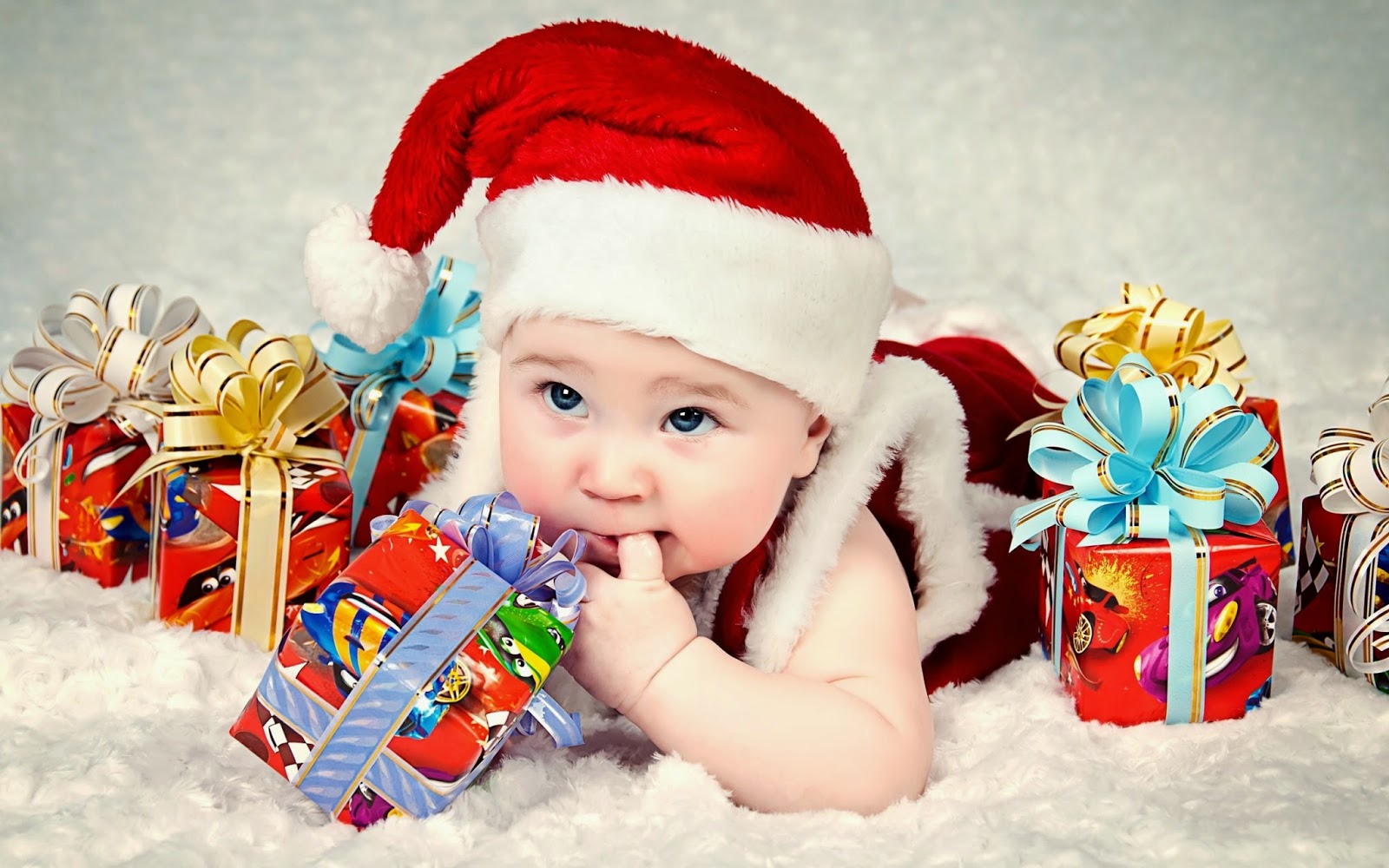 cute-christmas-baby-with-gifts