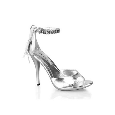 Glossy Silver Wedding Shoes with a beautiful jewel.