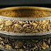 Broad golden bracelets