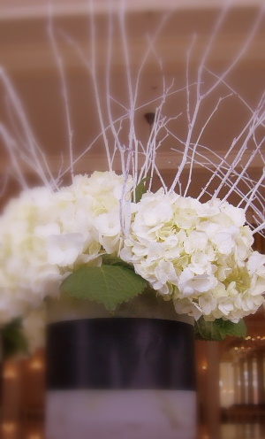 From the bridal bouquet to the smoky frost cylinder centerpieces crisp black