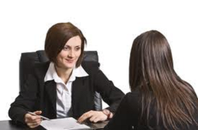 What do you mean by Interview and State its merits and demerits