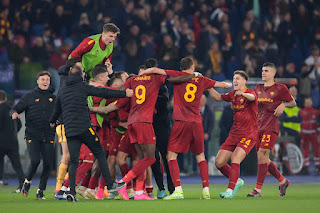 AS Roma players celebrate reaching the semi finals of the Uefa Europa League with a 4-2 aggregate victory over Feyenoord