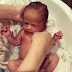 Chrissy Teigen shares adorable photo of baby Luna taking a bath 