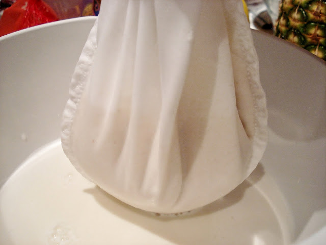 Strain the almond milk through a nut milk bag