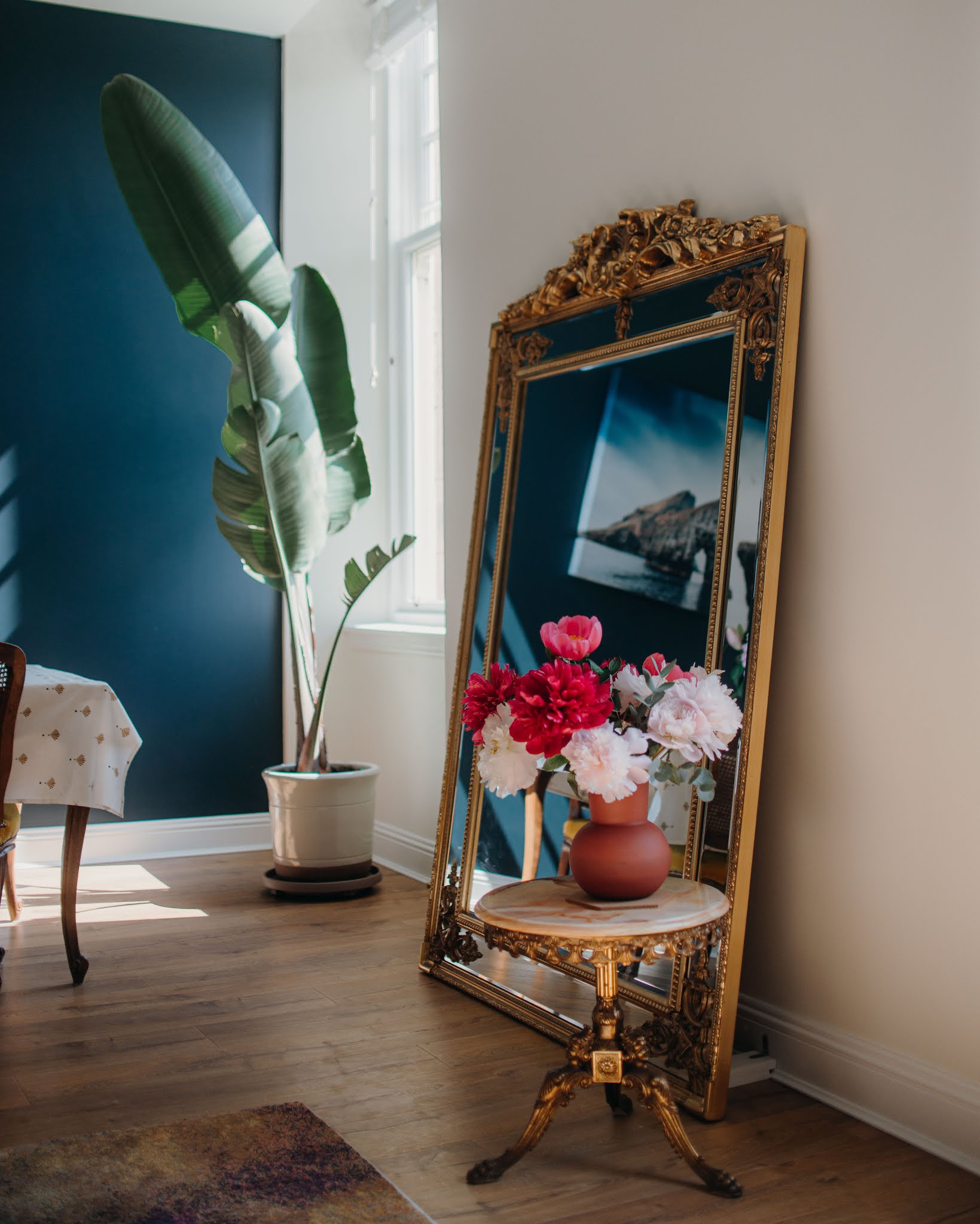 living dining room reveal large mirror antiques peonies plants liquid grain