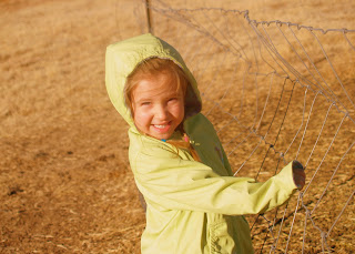 Sophia at the fence