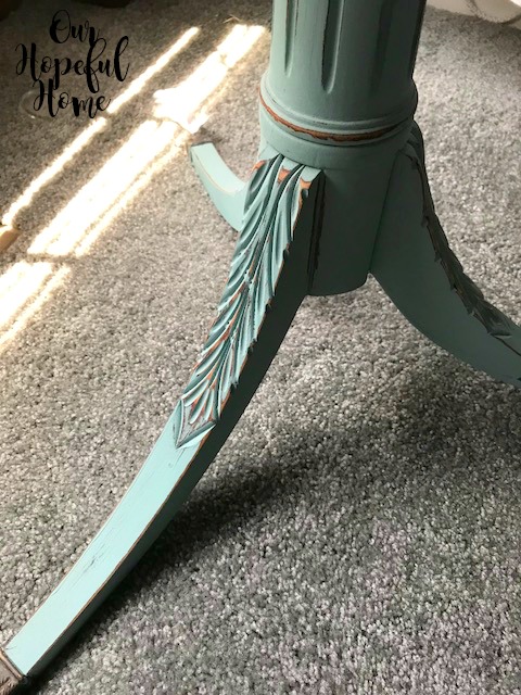 blue painted table leg with distressing