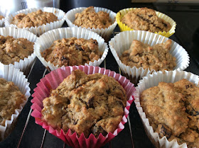 selection of sugar free Apple and raisin Rye Muffins on a cooling rack.