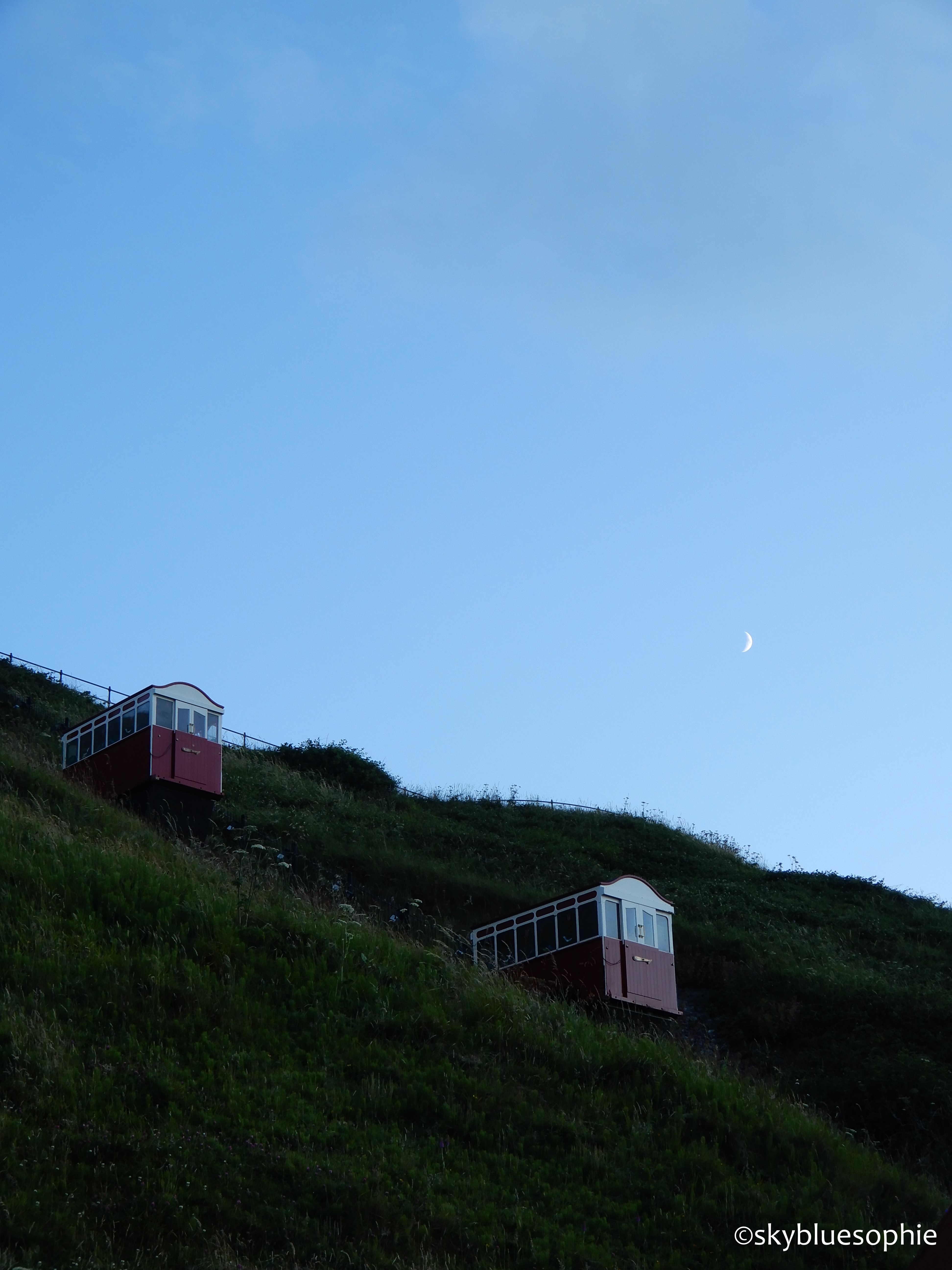 Saltburn Cliff lifts and the moon.