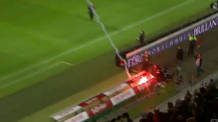 Wolfsburg fan throws flare into Hanover bench