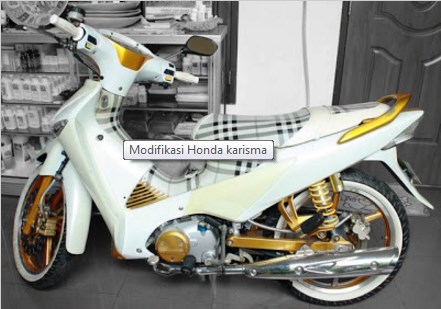 Foto Modifikasi Honda Kharisma cover aki dan box di comot semua dan yang tersisa Cuma bagian rangka yang di labur dengan warna putih bersih sok depan merk oxygen swing arm menggunakan dari supertrack 