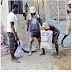 Man Lifts Bag Of Cement With His Teeth