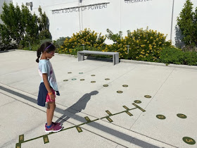Sundial on the sunny roof of science museum in Miami