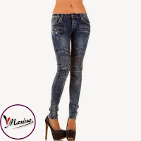 Jeansi skinny, de culoare albastra, cu buzunare false, decorate cu fermoare ( )