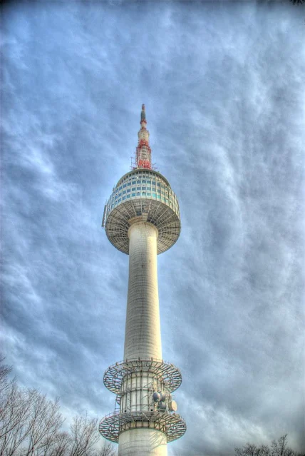 Namsan-N-Tower-Standing-Tall-Against-a-Cloud-Filled-Sky-Photo-Credit-Flickr-Christopher-Jetton