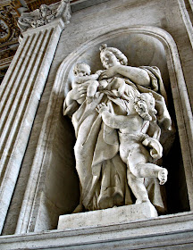 mother with children statue in the Sistine chapel in Rome