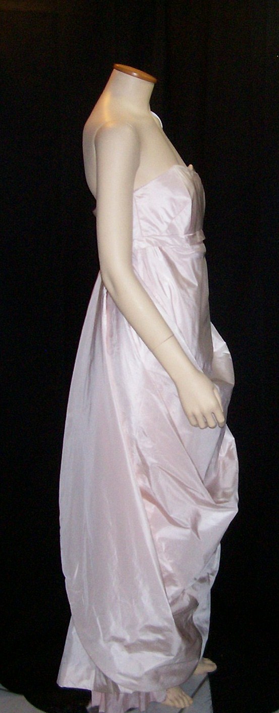 The sample was a bridal gown with beaded lace and light pink silk taffeta I 