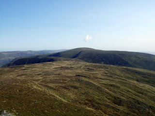 Looking back to Driesh, a wisp of cloud above its summit