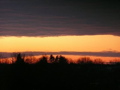 dawn sky with layered clouds