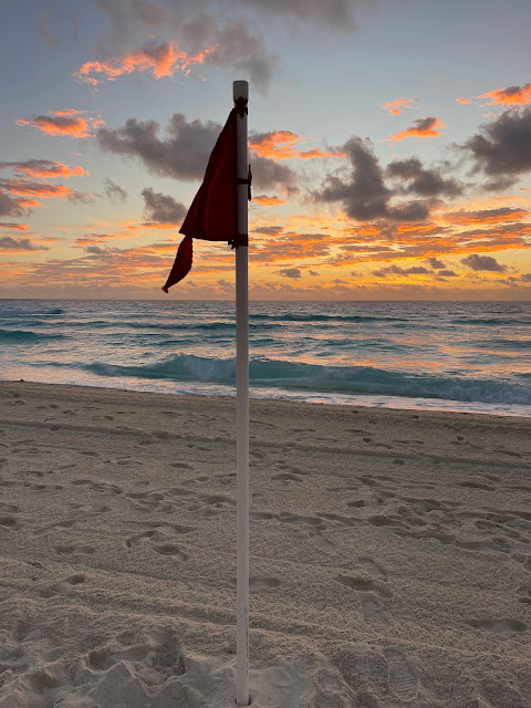 sunrise and red flag