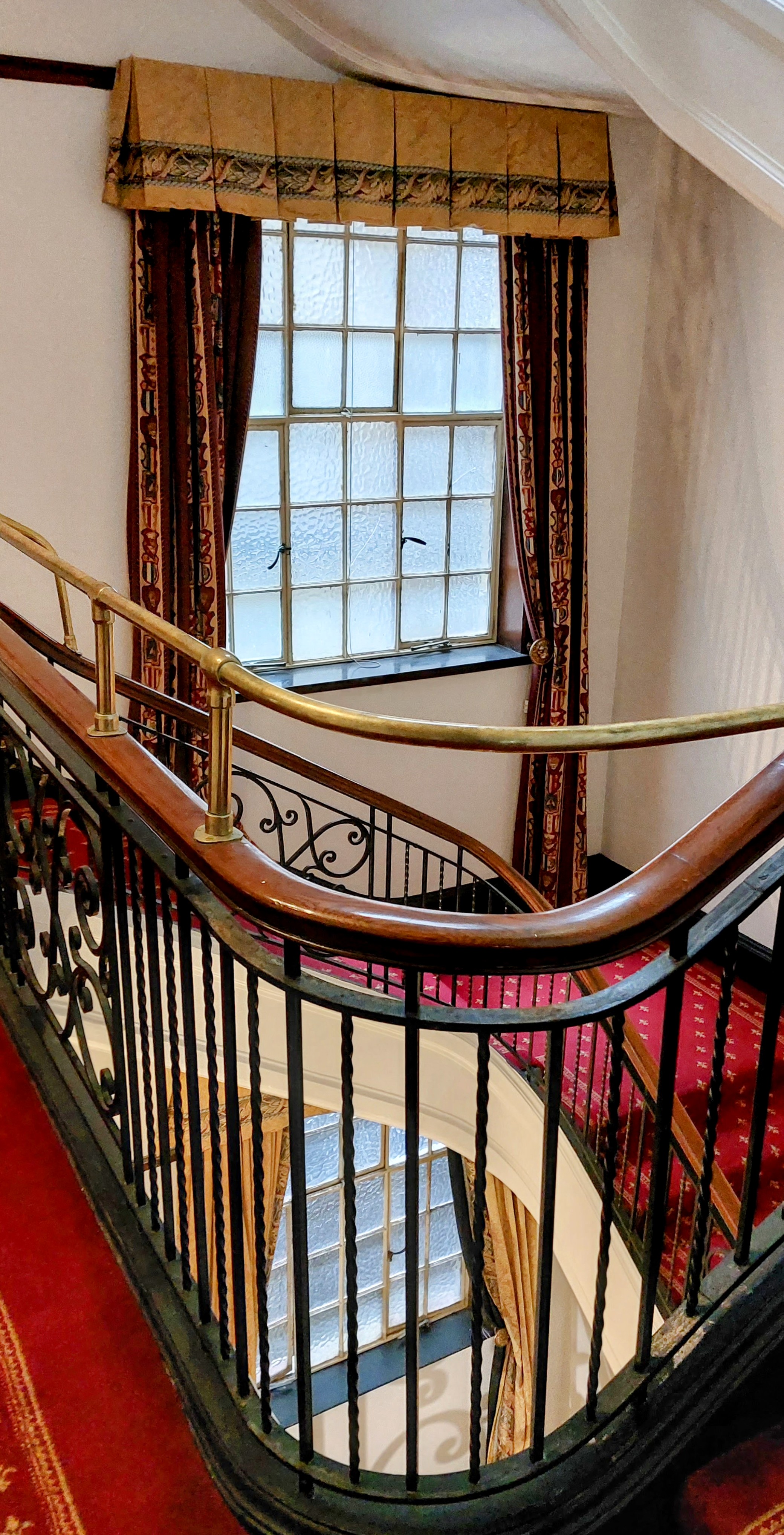 Plush stairs and bannisters of the Wellesley Boutique Hotel